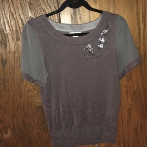 Gray sweater/blouse.